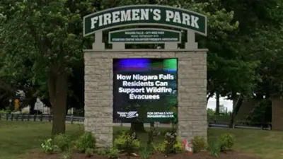 Image of the Firemen's Park digital message board at the entrance of the park.