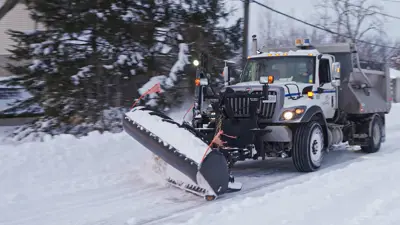 City of Niagara Falls snowplow clearing local road 